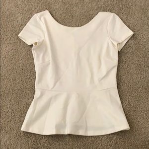 White peplum top